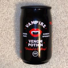 a can of vampire venom potion sitting on the floor next to a wall