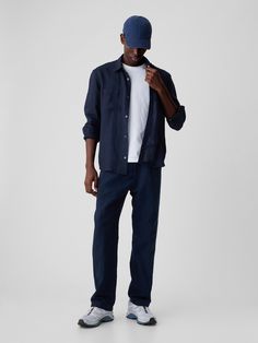 Soft linen-cotton pleated trousers.  Concealed hook and bar closure, zip fly.  Front slant pockets, back welt pockets.  Fit: Classic.  An easy silhouette that fits close at the waist, and is relaxed through the hips and thigh.  Models are 6′1″–6′2″ 185 cm–188 cm) with a 31″ 79 cm) waist & 32–33″ 81 cm–84 cm) inseam & are wearing Gap Easy Silhouette, Pleated Trousers, Soft Hands, Navy Pants, New Classic, Welt Pockets, Welt Pocket, New Black, Mens Pants