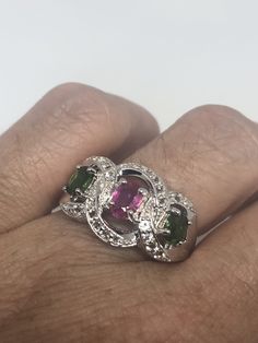 Unusual Deep Toned tourmaline Sterling Filigree Setting Handmade Size 7 Can be resized by laser for a $10-$20 jeweler's fee. All rings are shipped in a nice gift box. Check out our over a THOUSAND great reviews Engraving is $4 per letter and is not always perfect depending on the piece. It can take a few days if the jeweler is busy. This is payable to Paypal Judithsltd@gmail.com Silver Tourmaline Gemstones For Fine Jewelry, Silver Tourmaline Ring With Accent Stones, Silver Tourmaline Ring With Multiple Stones, Silver Tourmaline Ring With Gemstone Accents, Silver Tourmaline Multi-stone Rings, Multi Stone Ring, 925 Sterling Silver Ring, Vintage Rings, Tourmaline