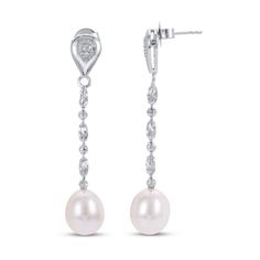 These chic dangle earrings for her feature classic freshwater cultured pearls suspended from 2-inch sterling silver beaded chains. White topaz gemstones sparkle above to finish the look. The sterling silver earrings secure with friction backs. Formal Dangle Pearl Chain Jewelry, Classic Dangle Jewelry With Pearl Chain, Fine Jewelry Pearl Drop Dangle Earrings, Formal Silver Earrings With Pearl Chain, Elegant Long Drop Hypoallergenic Jewelry, Formal Long Drop Pearl Drop Jewelry, Formal Silver Pearl Chandelier Earrings, Elegant Hypoallergenic Long Drop Jewelry, Formal Silver Chandelier Earrings With Pearl Drop