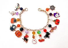 a bracelet with many charms attached to it