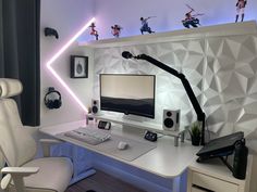 a white desk topped with a computer monitor and keyboard