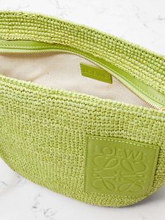 Designer Woven Leather Beach Bag, Designer Green Summer Bag, Designer Green Summer Bags, Designer Green Bags For Summer, Designer Straw Bag With Intrecciato Weave For Vacation, Luxury Summer Straw Bag With Intrecciato Weave, Designer Summer Straw Bag With Top Handle, Designer Bags With Intrecciato Weave For Summer, Designer Summer Bags With Intrecciato Weave