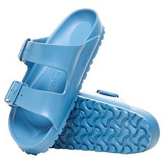 Birkenstock Arizona EVA Sandal  Make a splash wearing this lightweight sandal. They're made with the Birkenstock contoured footbed you know and love, only it's all part of the waterproof EVA design. Cushioned Footbed Synthetic Sandals For Beach, Comfortable Slip-resistant Blue Sandals, Synthetic Footbed Sandals With Arch Support For Beach, Blue Cushioned Sandals For Swimming, Blue Sandals With Cushioned Footbed, Comfortable Waterproof Slides For Vacation, Slip-resistant Beach Slides, Comfortable Non-slip Pool Sandals, Comfortable Waterproof Sandals With Round Toe