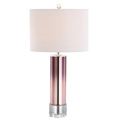 a table lamp with a white shade on it and a silver base, in front of a white background