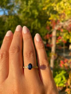 "Oval Cut 7x5 Sapphire Ring, Blue Sapphire Solitaire Ring, Chain Shaped Band, September Birthstone Ring, Gemstone Ring, Anniversary Gift for her Product Details ✿Made to Order ✿Gold Color : Available in Yellow Gold, White Gold, Rose Gold ✿Gold Kt : 14K ( also available in 18k) ✿Gemstone : Blue Sapphire ✿Size of Sapphire : 7 x 5 ✿Sapphire Ct : 1 ct ✿Setting Type : Prong Setting ✿Band Width: 2.40 mm ✿Band Height: 1.40 mm ---- PRODUCTION TIME ---- This ring will be made for you and ready to be ship 14k Gold Sapphire Jewelry With Prong Setting, Oval Sapphire Solitaire Birthstone Ring, Sapphire Solitaire Promise Jewelry, Promise Jewelry With Sapphire And Accent Stones, Sapphire Emerald Cut Ring With Bezel Setting, Oval Sapphire Ring With Bezel Setting, Yellow Gold Emerald-cut Sapphire Ring With Accent Stones, Oval Yellow Gold Promise Jewelry, Promise Sapphire Jewelry With Accent Stones