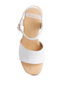 Elevate your style with the versatile Sawor Recycled Leather High Block Sandals. Whether for semi-casual occasions or work wear, their subtle, chic, and sophisticated design is perfect. The light cushion insole provides all-day comfort while their easy styling makes them a must-have for any wardrobe. SPECIFICATIONS: Type: Platform Sandals Upper Material: Recycled Leather Light Cushion Insoles Outer Sole: Pleather High Platform Block Heel Open Round Toe Stud Embellishments Pin Buckle Fastening RC Chic Adjustable Wedge Sandals For Day Out, Chic Adjustable Wedge Sandals With Block Heel, Chic Everyday Heels Medium Width, Chic Sandals With Adjustable Strap, Chic Spring Wedge Sandals With Adjustable Strap, Chic Summer Wedge Sandals With Adjustable Strap, Chic White Sandals With Adjustable Strap, Chic White Heels With Adjustable Strap, Chic Everyday Open Toe Sandals