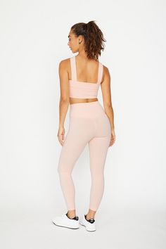 Product Details A classic low-key workout and everyday cropped legging, crafted in the ultra-soft performance fabric, high-waist with a wide waistband, hidden card pocket, tonal logo on hip, 7/8 length with 25” inseam. Complete the matching look with Leah bra top. Medium support for active and street. Materials & Care Composition: 75% Nylon, 25% Spandex. Machine wash cold with like colors, do not bleach, wash inside out. Hang or lay flat to dry, do not tumble dry. Do not dry clean. Model is wear Athleisure Leggings With Contoured Waistband, Medium Support, Pink 4-way Stretch Yoga Tights, Pink 4-way Stretch Workout Leggings, Functional Pink Yoga Leggings, Functional Pink 4-way Stretch Yoga Pants, Functional Pink Yoga Pants With 4-way Stretch, Pink Athleisure Yoga Pants, Pink 4-way Stretch Tights For Yoga, Pink Athleisure Leggings For Light Exercise