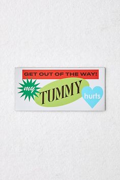 a sticker that says get out of the way and tummy hurts