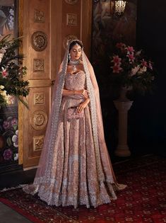 Premium Pakistani Bridal Dress in Pink Lehenga and Choli Style has a perfect balance of style and elegance. This stunning Bridal Lehenga Choli is a trendy masterpiece adorned with Embroidery and hand-crafted details of embellishments, making it an epitome of beauty and grace. Lavender Bridal Lehenga, Choli Style, Bridal Lehenga Pakistani, Pink Bridal Lehenga, Pakistani Bridal Lehenga, Pakistani Lehenga, Bridal Mehndi Dresses, Pakistani Bridal Dress, Pakistani Wedding Dress