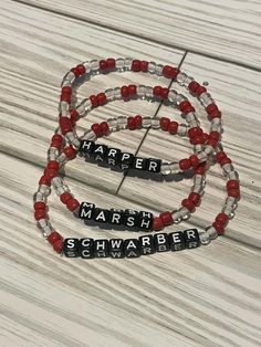 Handmade glass seed bead bracelet. Stretchy band. Red and white in a 3 piece set Glass Seed Bead Bracelet, Baseball Bracelet, Travel Coffee Cup, Living Wall Decor, Seed Bead Bracelet, Christmas Travel, Heishi Beads, Seed Bead Bracelets, Rhinestone Bracelet