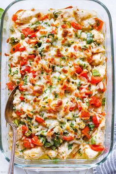 a casserole dish filled with chicken and vegetables