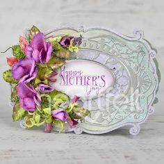 a mother's day card with purple flowers