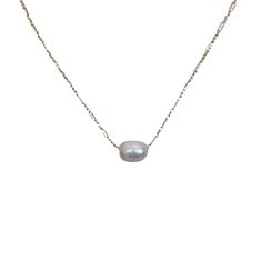 This elegant necklace showcases the timeless beauty of a single pearl delicately dangling from a dainty gold chain. The simplicity of the design highlights the natural allure of the pearl, creating a graceful and sophisticated piece. The necklace measures 16 inches in length, offering a classic and flattering fit around the neckline. Additionally, it can be adjusted to a shorter length of 15 inches, allowing you to wear it as a choker-style necklace for a more intimate and refined look. The sing Classic White Chain Necklace With Pearl Charm, Elegant Pearl White Chain Necklace With Delicate Chain, Classic White Pearl Drop Chain Necklace, Dainty Everyday Pearl Chain Necklace, Classic Pearl Charm Necklace, Classic Pearl Chain Necklace With Pearl Charm, Classic Pearl Necklaces With Delicate Chain, Classic Pearl Chain Necklace With Pearl Pendant, Dainty Pearl White Chain Necklace With Pearl Charm