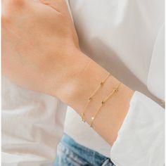 We love this sweet, dainty heart bracelet from ZOE LEV! Handcrafted from 14K Yellow Gold, this adorable bracelet is a perfect everyday bracelet to layer with your other favorite pieces. 7 Small Hearts Available in Yellow Gold & Rose Gold Adjustable Chain Length: 6"-7" Total Weight: Approx. 2 grams Delicate Gold Bracelet, Gold Heart Bracelet, Diamond Ear Cuff, Everyday Bracelet, Bracelet Heart, Gold Hearts, Solid Gold Chains, Bracelet Chain, Star Bracelet