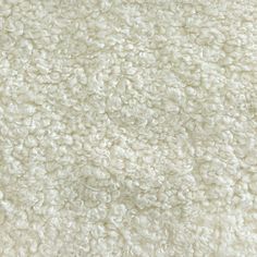 the texture of white carpet is very soft