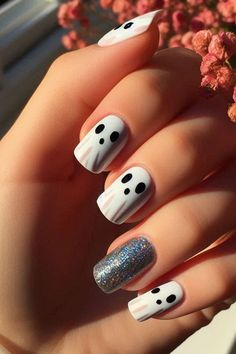 Decorating your nails for Halloween is a fun way to embrace the spooky season. This post contains 29 different Halloween nail designs you can create at home. Ideas, black, designs, art, cute, Disney, spooky, unique, simple, short, subtle, art, acrylic, almond, orange, easy Almond Shape Halloween Nails Simple, Easy Nail Halloween Designs, Halloween Nail Designs On Natural Nails, Rounded Halloween Nails, Simply But Cute Nails, How To Decorate Nails, Nails For Halloween Easy, Nail Ideas One Color No Design, Halloween Nails Not Acrylic