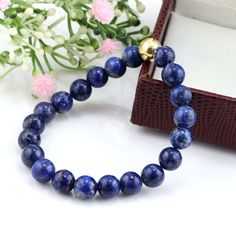 Lapis Lazuli Bracelet, Genuine Lapis Lazuli Beaded Bracelet, 8mm Genuine Lapis Lazuli bracelet, 22K gold filled  Metal: 22k gold Filled  Gemstone name: Lapis lazuli Gemstone Size 8mm Bracelet size: Adjustable Lapis Lazuli Bracelet, Lapis Lazuli Beads, Lapis Lazuli Gemstone, 22k Gold, Bracelet Sizes, Lapis Lazuli, Arm Band, Beaded Bracelet, Favorite Jewelry