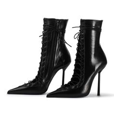 Step into retro chic with these black vintage pointed-toe booties, featuring a vamp cut design and lace-up closure. Elevate your style effortlessly with a touch of timeless sophistication. Color: Black Heel Type: Stiletto heel Heel Height: 4.72'' / 120 mm approx Product measurements were taken using size 8. Please note that measurements may vary by size. Toe: Pointed toe Vamp-cut design Lace-up design Side-zipper design Handcrafted US sizing. Fits true to size Modern Heritage, Retro Chic, Ballet Flat Shoes, Pump Sandals, Dolce & Gabbana, Lace Boots, Black Ankle Boots, Boots Black, Top Shoes