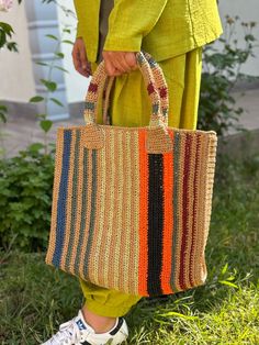 Paper Rope Striped Bag🧶👜 The paper rope striped bag, which attracts attention with its natural and stylish design, is both environmentally friendly and durable accessory. This special handmade bag offers a wide range of uses, from daily use to the beach bag.🌊 While adding a natural and modern touch to your style, it will make you happy to make an environmentally sensitive choice. This special bag, which you can think of as a gift for both yourself and your loved ones, will accompany you at every moment. SIZES Width: 40CM Height:30CM Base width:11CM Height with bag hanger:55CM  I CAN SHIP 2 OR 3 DAYS. Multicolor Basket Crochet Bag Casual Style, Multicolor Basket Crochet Bag, Casual Multicolor Crochet Basket Bag, Multicolor Rectangular Jute Shoulder Bag, Multicolor Rectangular Crochet Jute Bag, Multicolor Rectangular Jute Crochet Bag, Striped Woven Tote Bag, Multicolor Jute Crochet Bag For Daily Use, Striped Woven Rectangular Shoulder Bag