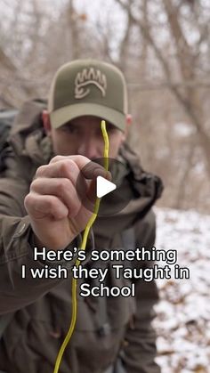 a man holding a yellow string in front of his face with the caption here's something i wish they taught in school