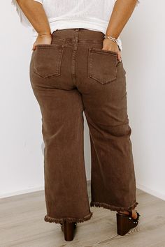 - These sweet jeans are perfectly stylish! - Stretchy denim - A waistline with belt loops, a hidden zip fly, and button closure - Functional front and back pockets - A relaxed silhouette that ends in unfinished ankle length hemlines with frayed detail Measurements 1XL : Front Rise 13", Hip 40", Inseam 26", Length 39", Waist 36". 2XL : Front Rise 13", Hip 42", Inseam 26", Length 39", Waist 38". 3XL : Front Rise 13.5", Hip 44", Inseam 26", Length 39.5", Waist 40". High Rise Brown Denim Flare Jeans, Brown Fall Jeans With Belt Loops, Brown Jeans With Belt Loops For Fall, Mid-rise Brown Flare Jeans, Mid-rise Brown Flare Jeans With Pockets, Brown Mid-rise Flare Jeans With Pockets, Brown Bottoms With Frayed Hem For Fall, Fall Brown Bottoms With Frayed Hem, High Rise Brown Cotton Flare Jeans