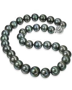 Tahitian Pearl Necklace with a 14 karat white gold spiral ball clasp. 35 pearls each between 11-14.4mm. 18″ long. Single Strand Tahitian Pearl Jewelry With Round Beads, Classic Tahitian Pearl Drop Necklaces, Tahitian Pearl Round Beads Formal Necklace, Formal Tahitian Pearl Necklaces With Round Beads, Formal Tahitian Pearl Round Bead Necklaces, Formal Single Strand Tahitian Pearl Necklace, Luxury Tahitian Pearl Necklace For Formal Occasions, Luxury Tahitian Pearl Necklace With Round Beads, Luxury Tahitian Pearl Round Bead Necklace