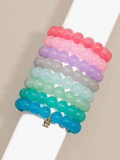 The Layla Beaded Bracelet pairs effortlessly with your favorite bangles and other stretch bracelets, making it the perfect foundation for your arm party. The glossy finish of the glass beads gives a subtle shine to each boldly colorful hue. -Stretch -1" Width -3" Diameter -0.1 Lbs -Nickel and Lead Compliant (Hypoallergenic) Bracelets Making, Arm Party, Perfect Foundation, Glass Beaded Bracelets, Cute Bracelets, Pink Turquoise, Hair Accessories Jewelry