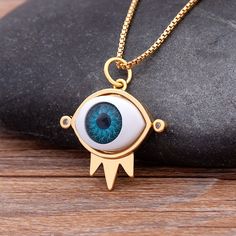 Zircon Jewelry- New Arrival Personalized Design Blue Evil Eye Pendant Necklace for Woman Couple Choker Lucky Friendship Jewelry Gifts Weight: 8g Style: Classic Style: Women Men Star Pendant Necklace Shape\pattern: Geometric Shape: Geometric Occasion: Party Necklace Type: Pendant Necklaces Name: AAA Cubic Zircon Chain Link Necklace Model Number: 3256804472309954 Metals Type: Copper Material: Cubic Zirconia Item Type: Necklaces Gender: Unisex Function: Mood Tracker Fine or Fashion: Fashion Fashion Blue Metal Charm Necklace With Adjustable Chain, Light Blue Metal Jewelry For Gifts, Blue Metal Charm Necklace With Round Pendant, Blue Alloy Pendant Jewelry, Blue Metal Necklace With Charms, Blue Metal Jewelry With Adjustable Chain, Light Blue Metal Necklace For Gift, Adjustable Blue Charm Necklaces, Adjustable Blue Necklaces With Charms