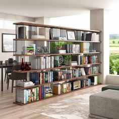 a living room filled with furniture and a book shelf next to a window on top of a hard wood floor