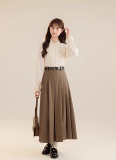 Your favorite tennis skirt style but in a longer version! Complete with belt loops and an elastic back. S: 25" waist, 33" lengthM: 26.5" waist, 33" lengthL: 28" waist, 33" length Casual Belted Pleated Skirt For Work, Casual Belted Skirt For Work, Casual Skirt With Belt For Workwear, Casual Workwear Skirt With Belt, Belted Skirt For Office In Spring, Casual Long Belted Skirt, Tennis Skirt Style, Skirt Style, Shoe Gifts