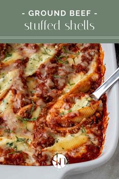 a white casserole dish filled with ground beef stuffed shells