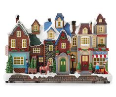 a christmas village with houses and people