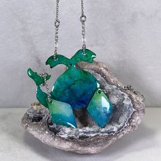 A fascinating piece that captivates you with its colors. This unique coloring pattern is created using Resin Alcohol Inks, which makes each piece unique. Check out my video. 1 3/4 x 1 3/8 Dimensions: ☆ Handmade Whale necklace designed from Solid Copper. Whale Pendant is 1 3/4 inches wide and 1 3/8 inches tall. The Stainless Steel Cable Chain links are 3.2mm wide with Stainless Steel Twisted Bar Connectors. The chain length can be customized. ☆ Handmade Diamond Shaped dangle earrings designed from Solid Copper. Diamond Shape Pendants are 5/8 inches wide and 1 inches tall, and the total drop length is 2 3/8 inches including the Stainless Steel Twisted Bar Connectors and Stainless Steel ear wires. How it's Made: ☆ Copper pendants are hand-cut from a solid copper sheet using a German style jew Artistic Dangle Jewelry As Gift, Artistic Dangle Jewelry For Gifts, Artistic Design Dangle Jewelry Gift, Hand Painted Turquoise Jewelry Gift, Turquoise Hand Painted Jewelry Gift, Unique Teardrop Jewelry With Artistic Design, Artistic Resin Dangle Jewelry, Artistic Hand Painted Turquoise Jewelry, Artistic Hand-painted Turquoise Jewelry