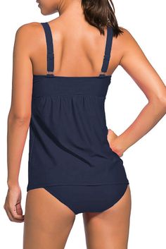 Enhance your inner goddess in the perfect swimsuit. Concealing style with power mesh control, the new arrival 2pcs Swing Tankini Swimsuit provides an amazing fit plus a full interior bra with molded cups to provide shape and modest support. Bandeau swing top has no underwire, and bra paddings are undetachable. Matching with a class solid stretch triangular swim bottom. 

Features 


	•Figure-flattering shirred bandeau swimdress with a bottom


	•Waist length style tankini, tummy control lining, Underwire Tankini With Built-in Cups For Pool, Underwire Tankini With Built-in Bra For Pool, Beachwear Tankini With Built-in Cups For Swimming, Fitted Beach Tankini With Medium Bust Support, Fitted Tankini With Medium Bust Support For Beach, Summer Full Coverage Tankini With Built-in Bra, Summer Beach Swimwear With Medium Bust Support, Full Coverage Swimwear With Built-in Cups For Beach, Solid Color Tankini With Built-in Padding For Swimming