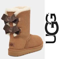 This Bailey Bow Boot Swaps Silk For Suede, With A Fixed Bow For A Sweet Touch. With Soft Suede, Cozy Uggplush Lining, And A Lightweight, Flexible Outsole, The Bailey Bow Boots Deliver Signature Ugg Comfort. * Suede Upper * Fixed Suede Bow * 17mm Uggplush 60% Upcycled Wool, 40% Tencel Lyocell Lining & Sock Liner * 8" Shaft Height * Woven Heel Label With Ugg Logo Size: 7 Msrp: $230 Brand New Ugh Boots Bows, Bow Uggs, Youtuber Dr, Uggs With Bows, Dr Shoes, Bailey Bow Uggs, Bow Boots, Ugg Bailey, Shoe Wishlist