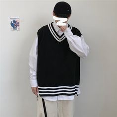 Wiaofellas Men Sweater Vests Striped Sleeveless V-neck Knitted Shrug Ins Preppy Style Ulzzang Chic Leisure Loose Male Clothing Harajuku New Casual Knitted Tank Top For Winter, Casual Knitted V-neck Tank Top, White V-neck Tank Top For Winter, Casual Black Sleeveless Sweater, Casual Black V-neck Sweater Vest, Knitted Shrug, Male Clothing, Knit Shrug, Sweater Vests