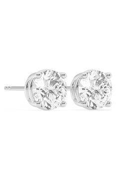 Round lab-grown diamonds sparkle within 14K white gold settings to create these elegant stud earrings. Post back Total lab-grown-diamond weight: 5.00ct. Color: IJ Clarity: V-S 14k-white gold/lab-grown diamond Made in the USA Diamond Guide 14k White Gold Brilliant Cut Earrings For Anniversary, Classic White Brilliant Cut Diamond Earrings, 14k White Gold Prong Setting Earrings For Anniversary, White Platinum Diamond Earrings With Brilliant Cut, White Platinum Round Diamond Earrings, Classic Platinum Solitaire Diamond Earrings, Timeless White Solitaire Diamond Earrings, White Diamond Solitaire Round Cut Earrings, 14k White Gold Earrings With Prong Setting For Anniversary