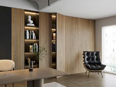 a room with a desk, chair and bookshelf on the wall next to a window