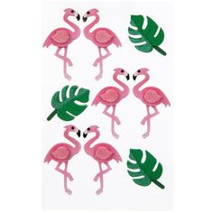 pink flamingos and green leaves are arranged in the shape of magnets on a white background