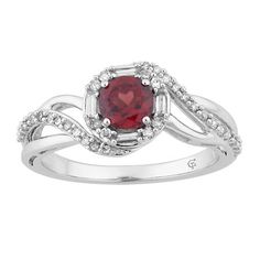 a ring with a red stone in the center and white diamonds around it, on a white background