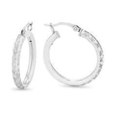 From the Brilliance Fine Jewelry collection, these remarkable Hoop Earrings are crafted from the finest sterling silver which has been flash plated in rhodium to prevent tarnishing and maintain a lustrous shine. The result is a shimmering and glistening hoop earring that shimmers in the light. The 25mm diameter hoop earring is crafted from 3mm sterling silver tubing which has been curved into a round hoop. The ends of the tubes have been squared off, and a hinged clasp is used to easily secure t Brilliant Cut Sterling Silver Small Hoop Earrings, Formal Brilliant Cut Sterling Silver Hoop Earrings, Hypoallergenic Sterling Silver Diamond Hoop Earrings, Luxury Sterling Silver Diamond-cut Hoop Earrings, Silver-plated Cubic Zirconia Hoop Earrings, Fine Jewelry Collection, Silver Diamonds, Diamond Cut, Sterling Silver Earrings