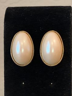 Vintage Earrings. Times of Love & Peace. w/Pearl-like object sliced as a celestial vault, 18x27x10mm (45/64x1 3/64x13/32") L, 9.4g (0.33oz) W. I could not ascertain the nature of the object. I assume it's a pearl sliced in half or mother pearl, but it could likewise be of synthetic material. But it is a vintage piece. Vintage jewelry is a unique craft beauty. Preowned circa the 1970s. Unique Crafts, Love Peace, Mother Pearl, Austin Tx, Jewelry Earrings Studs, Vintage Earrings, Peace And Love, Of Love, Austin