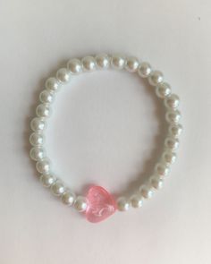 pink heart bracelet ༉ ༄ length ~ 7in ༄ price ~ $4 Adjustable Pearl Bracelet For Valentine's Day, Valentine's Day Pearl Bracelet With Heart Charm, Valentine's Day Heart Charm Pearl Bracelet, Elegant Pink Stretch Bracelet For Everyday, Valentine's Day Heart Pearl Bracelet, Cute Bracelets With Heart Charm For Valentine's Day, Cute Heart Charm Bracelet For Valentine's Day, Cute Heart Bracelets For Valentine's Day, Cute Heart-shaped Bracelets For Valentine's Day