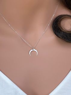 Crescent Moon Necklace in sterling silver. It makes with .. -Sterling Silver Hammered Crescent Moon Pendant 16x16mm, -Sterling silver cable chain wt spring clasp, -Come up with beautiful ribbon gift box and -One set of Care instruction package. Personalized Gifts https://www.etsy.com/shop/rainbowearring?ref=listing-shop2-all-items-count§ion_id=11442300 IF you are not sure about chain length or would like to adjust the length of the necklace, please Add Adjustable chain extender https://www.etsy. Dainty Moon Necklace, Luna Necklace, Tusk Necklace, Double Horn Necklace, Sand Dollar Necklace, Half Moon Necklace, Gold Moon Necklace, Moon Phases Necklace, Ribbon Gift