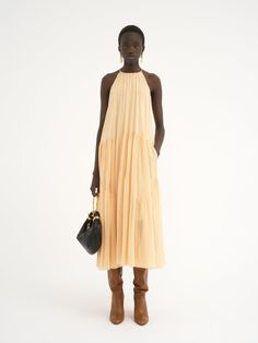 Chloé Long Gathered Sun Dress In Silk Georgette | Chloé US Summer Silk Chiffon Flowy Dresses, Casual Summer Silk Chiffon Dresses, Summer Flowy Silk Chiffon Dress, Sleeveless Silk Chiffon Dress For Summer, Flowy Silk Chiffon Summer Dress, Summer Silk Chiffon Dress With Ruffles, Summer Sleeveless Silk Chiffon Dress, Summer Silk Tiered Maxi Dress, Summer Silk Chiffon Maxi Dress For Casual Wear