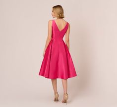 It does not get any more timeless or sophisticated than this mikado dress. This cocktail dress features a sleeveless fitted bodice, boat neckline, and a pleated flare skirt with pockets. A zipper closure and a deep v-back add a final touch to this semi-formal dress. Crafted from shiningmikado fabric, this fit and flare dress is a feminine style. Dressed up with bold accessories or streamline with simple details, this sleeveless dress is a versatile look you'll love for years to come. Style Numbe Pink Fit And Flare Dress, Mikado Dress, Pleated Flare Skirt, Fit And Flare Midi Dress, Flare Midi Dress, Western Dress, Semi Formal Dress, Bold Accessories, Pink Fits