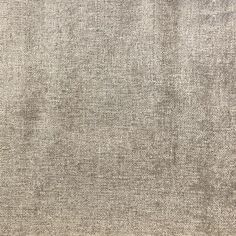 an old, worn and stained cloth textured with small dots in grey tones on a white background