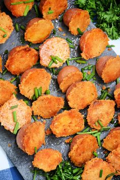 some fried food is on a plate with broccoli