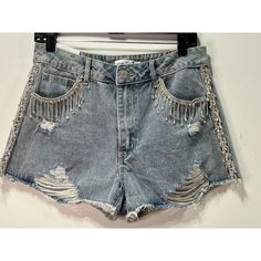 Rue 21 - Women's Mid-Rise Rhinestone Fringe Denim Shorts - Blue Wash - 10 -Size: 10 (Women's) -Measurements: Please See Photos Above For All Measurements -Material: Please See Photos For Materials Tag -Condition: New With Tags -Colors May Slightly Vary From Photography Lighting -Will Ship In One Business Day Package Weight: 14 Oz Package Dimensions: 7 X 10 X 2 In I Ship Items Out Every Day So Expect A Quick Delivery! Please Feel Free To Ask Any Questions You May Have. I Answer Most Questions Ins High Waist Rhinestone Denim Jeans, Casual High Rise Jeans With Rhinestones, Casual High-rise Rhinestone Jeans, Casual Denim Blue Bottoms With Rhinestones, Trendy Denim Blue Bottoms With Rhinestones, Spring Denim Blue Bottoms With Rhinestones, Denim Blue Rhinestone Bottoms For Spring, Spring Denim Blue Rhinestones Bottoms, Denim Blue Rhinestones Bottoms For Spring